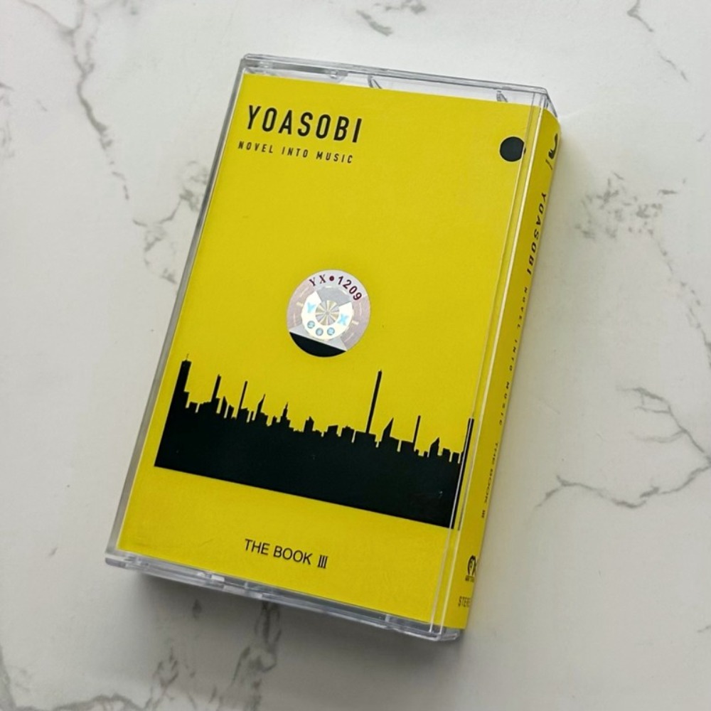 Audio Music In - YOASOBI Cassette Tape | THE BOOK