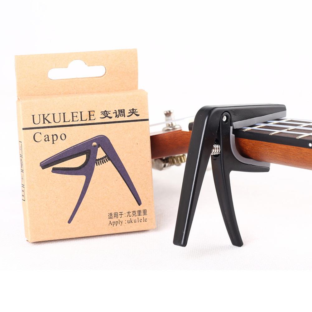 Professional Ukulele Capo Sing - Guitar Capo Clip recension och pris