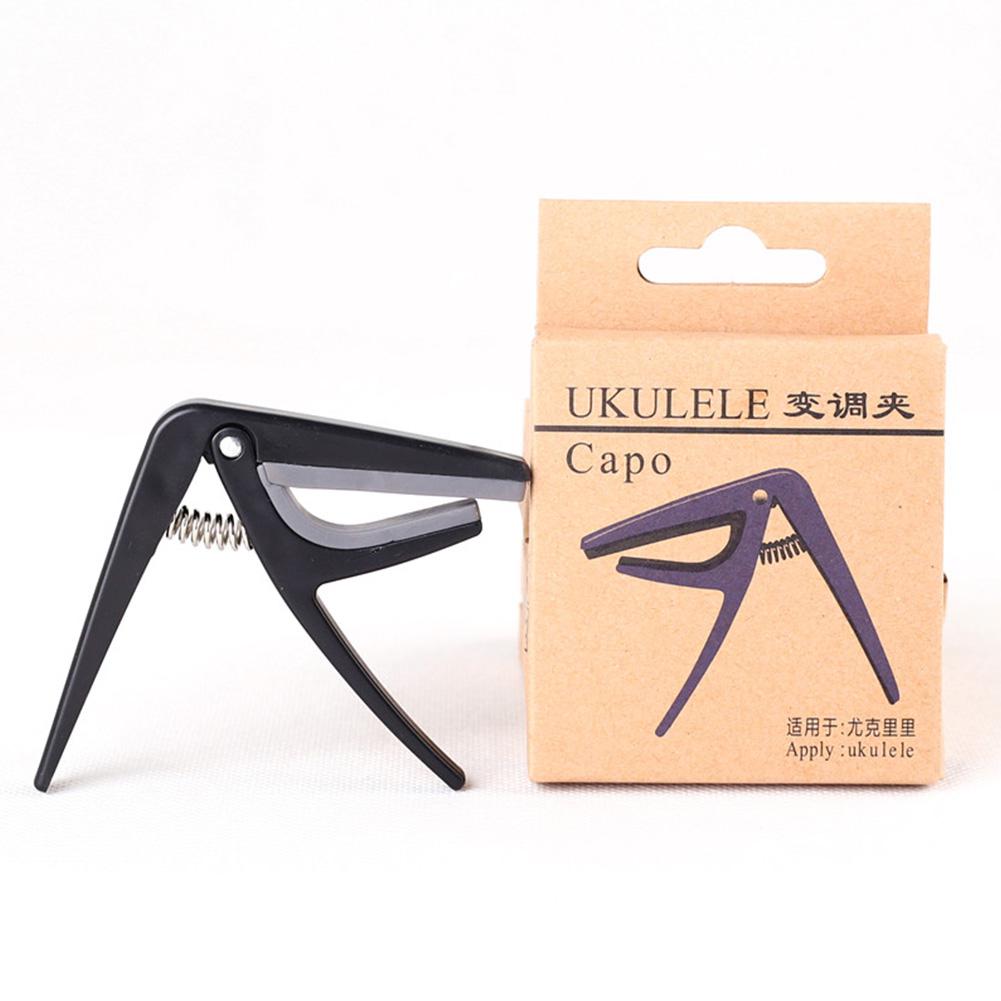 Professional Ukulele Capo Sing - Guitar Capo Clip recension och pris