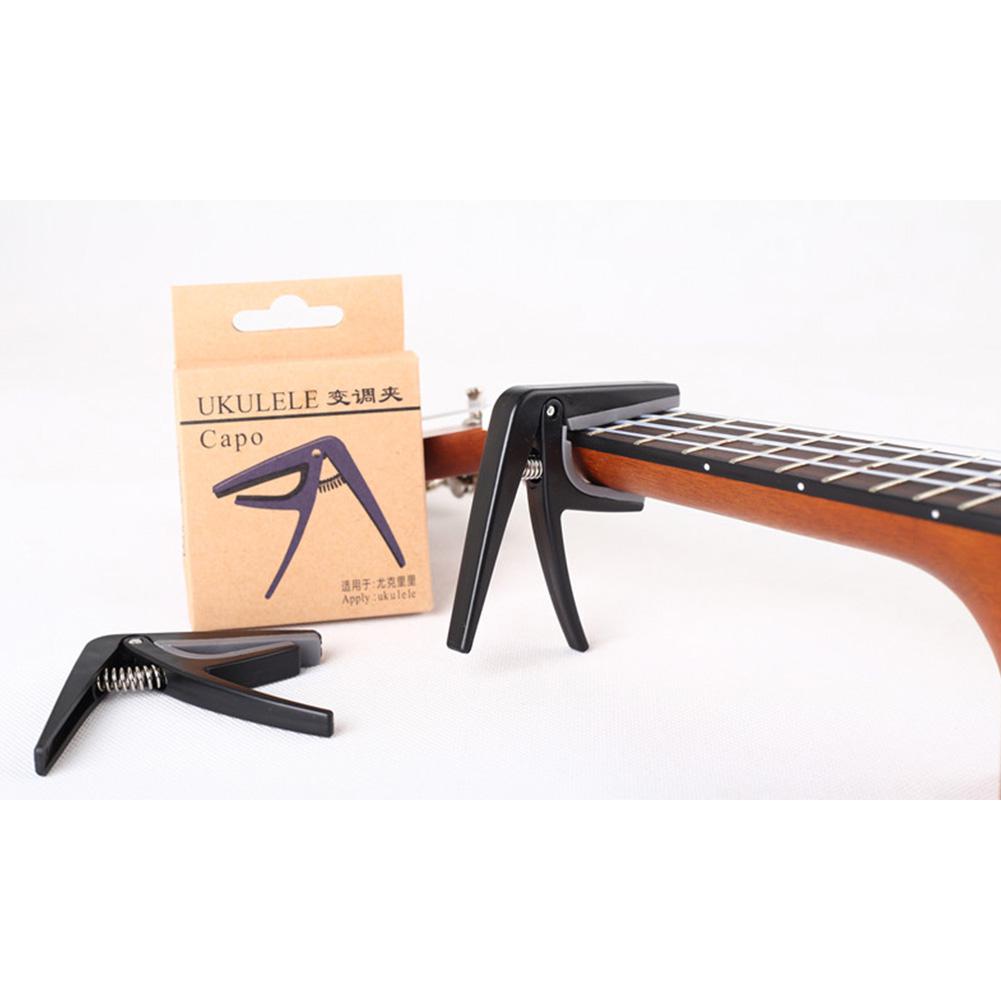 Professional Ukulele Capo Sing - Guitar Capo Clip recension och pris