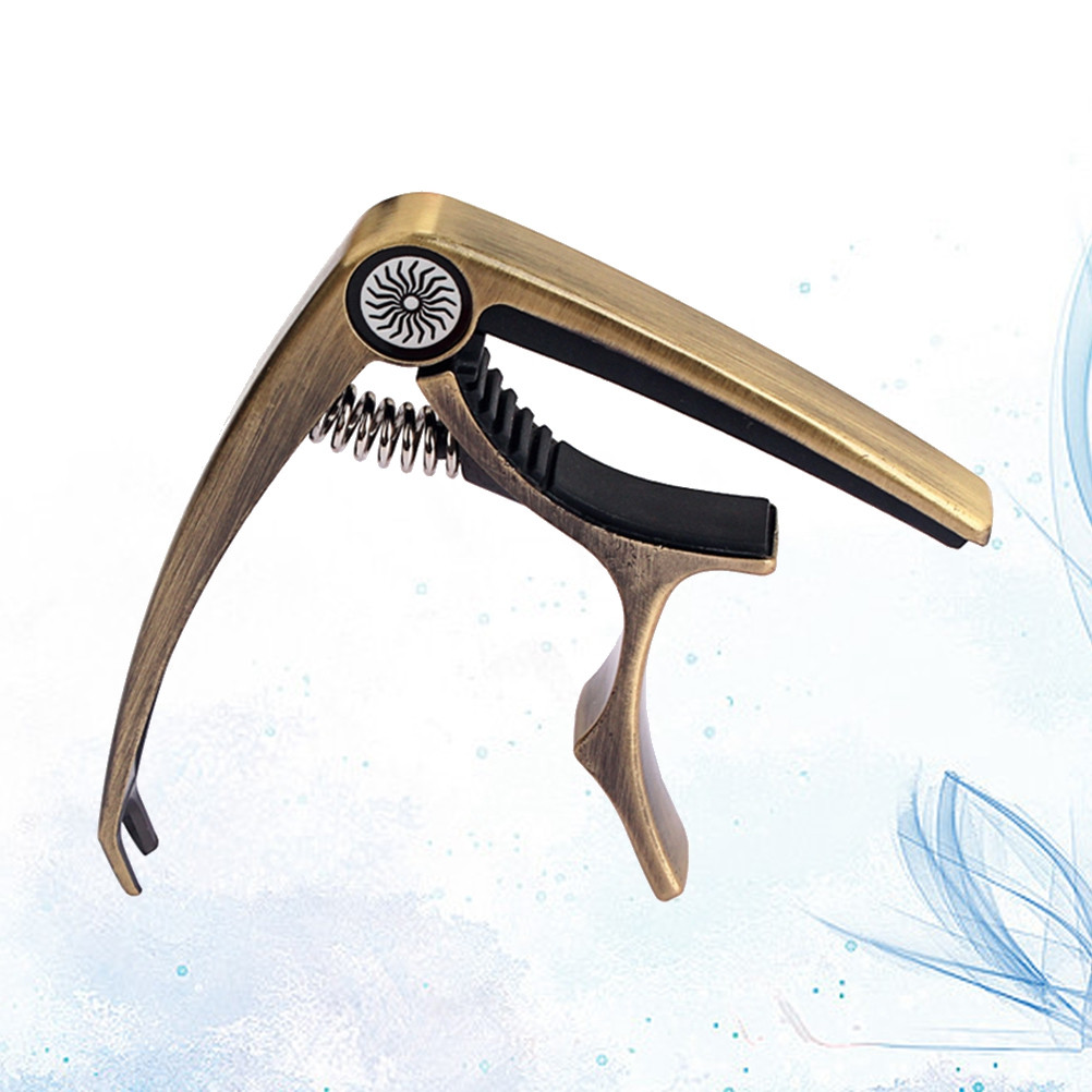 Guitar Capo Clip-on Tuner Gun- - Guitar Capo Clip recension och pris